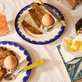 Late Afternoon Scallop Side Plate With Yellow Cutlery