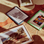 A collection of colourful photos frames