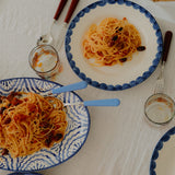Burgundy_Knife_Fork_Set with blue plates and platter