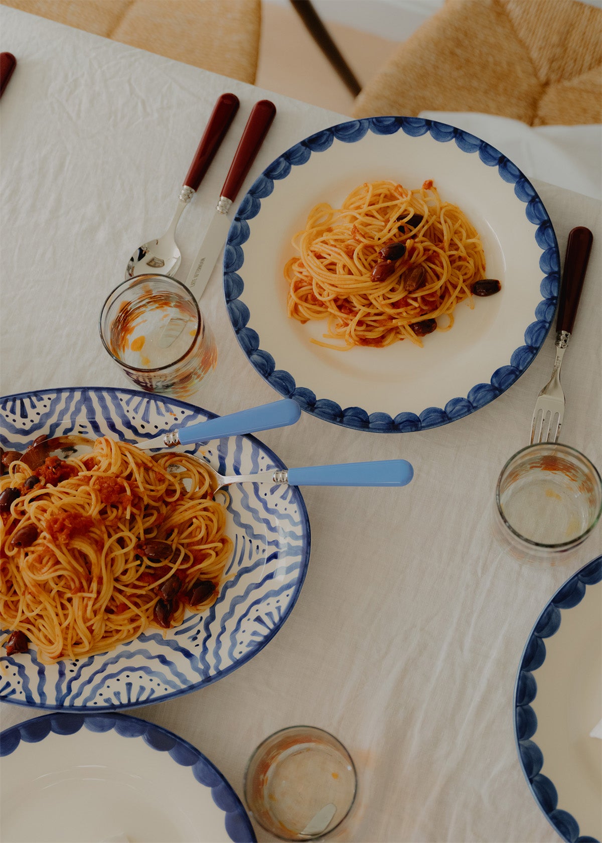 Burgundy_Knife_Fork_Set with blue plates and platter