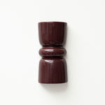 Late Afternoon Lighting Burgundy Up and Down lighter Ceramic Wall Light hung on a white wall