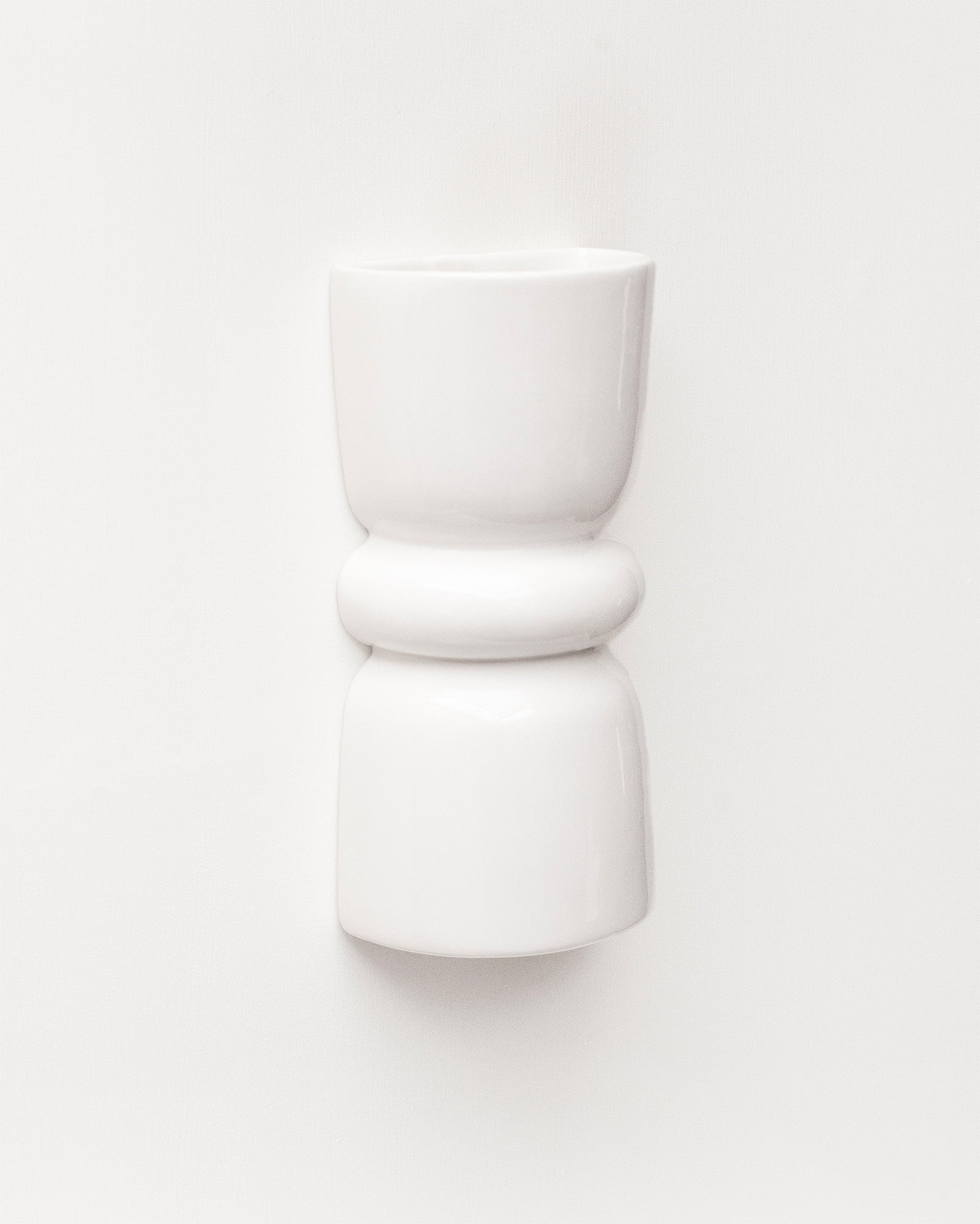 Late Afternoon Lighting White Up and Down lighter Ceramic Wall Light on a white wall