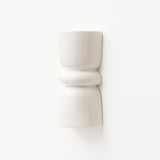 Late Afternoon Lighting White Up and Down lighter Ceramic Wall Light on a white wall