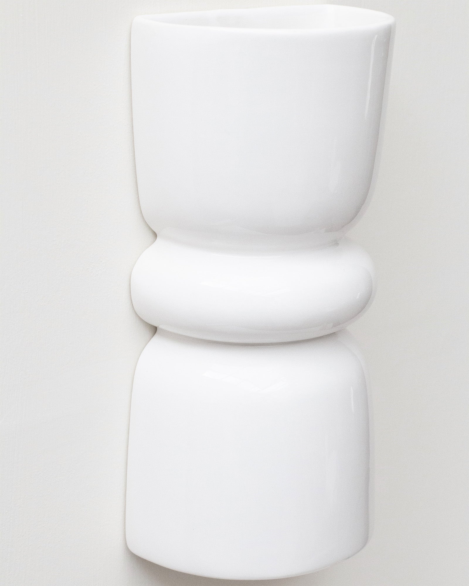 Late Afternoon Lighting White Up and Down lighter Ceramic Wall Light on a white wall
