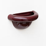 Late Afternoon Lighting Burgundy Uplighter Ceramic Sconce Wall Light on a white wall